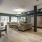 a large living room with couches and tables